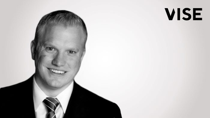 Travis-Fairchild-Senior-Investment-Strategist-Vise