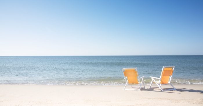 USA, Massachusetts, Nantucket, Two beach chairs on empty Surfside Beach