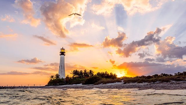 Lighthouse at Bill Baggs Cape Florida State Park at sunset, Florida, USA Lighthouse at Bill Baggs Cape Florida State Park at sunset, Florida, USA